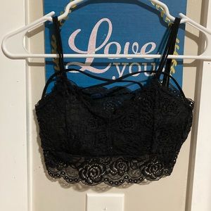 A Black Bralette or Belly shirt in Pretty Much Brand New